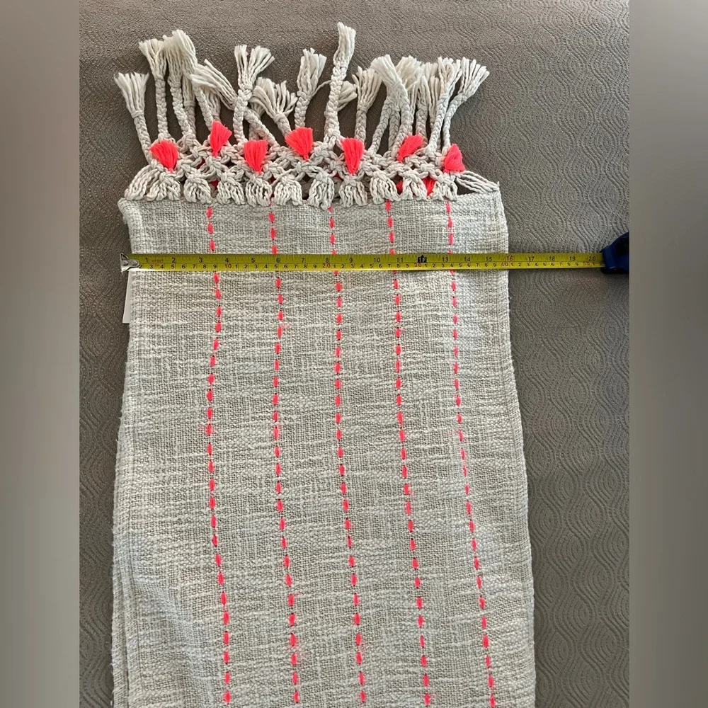 Anthropologie table runner in Cream and Pink/orange Tassel